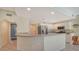 Modern kitchen with stainless steel appliances and ample counter space at 16450 Gloria Ln # 105, Nokomis, FL 34275