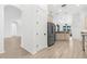 Open kitchen with granite countertops, stainless steel appliances, and ample storage space at 310 Lake Tahoe Ct, Englewood, FL 34223