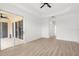 Bright living room with tile floors and sliding glass doors leading to outdoor space at 310 Lake Tahoe Ct, Englewood, FL 34223