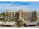 Condo building with parking and tropical landscaping at 2320 Terra Ceia Bay Blvd # 203, Palmetto, FL 34221