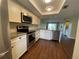Updated kitchen with granite countertops and stainless steel appliances at 2320 Terra Ceia Bay Blvd # 203, Palmetto, FL 34221