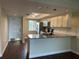 Modern kitchen with granite countertops and breakfast bar at 2320 Terra Ceia Bay Blvd # 203, Palmetto, FL 34221