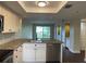 Updated kitchen with granite counters and stainless steel appliances at 2320 Terra Ceia Bay Blvd # 203, Palmetto, FL 34221
