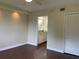 Primary bedroom with wood-look floors and ensuite bathroom at 2320 Terra Ceia Bay Blvd # 203, Palmetto, FL 34221