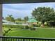 Relaxing pool area with lush landscaping and ample space at 2320 Terra Ceia Bay Blvd # 203, Palmetto, FL 34221