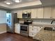 Bright kitchen featuring stainless steel appliances and granite counters at 2320 Terra Ceia Bay Blvd # 203, Palmetto, FL 34221