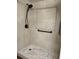Walk-in shower with pebble floor and neutral tile at 2320 Terra Ceia Bay Blvd # 203, Palmetto, FL 34221