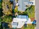 Aerial view of the property showcasing the home's layout, landscaping, and surrounding neighborhood at 1810 28Th W St, Bradenton, FL 34205