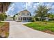 Charming two-story home with inviting front porch, detached garage and landscaped yard at 1810 28Th W St, Bradenton, FL 34205