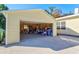 Garage interior with shelving and various storage items at 1810 28Th W St, Bradenton, FL 34205