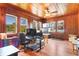 Inviting office space filled with natural light and wood-paneled walls at 1810 28Th W St, Bradenton, FL 34205