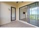 Private balcony with tiled flooring and sliding glass doors at 7718 Lake Vista Ct # 405, Lakewood Ranch, FL 34202