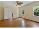 Bright bedroom with hardwood floors and access to en-suite bathroom at 4521 Bay Shore Rd, Sarasota, FL 34234
