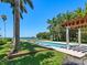 Relaxing rectangular pool with pergola and ocean views at 4521 Bay Shore Rd, Sarasota, FL 34234