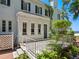 Back exterior view showing a patio and part of the house at 4521 Bay Shore Rd, Sarasota, FL 34234