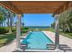 Inviting rectangular pool with pergola and breathtaking waterfront view at 4521 Bay Shore Rd, Sarasota, FL 34234