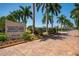 Grand entrance to Sarasota Surf and Racquet Club at 5920 Midnight Pass Rd # 104, Sarasota, FL 34242