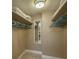 Spacious closet with ample shelving and hanging space at 5920 Midnight Pass Rd # 104, Sarasota, FL 34242