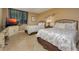 Comfortable guest bedroom with two twin beds and built-in desk at 5920 Midnight Pass Rd # 104, Sarasota, FL 34242