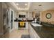 Well-equipped kitchen with granite countertops and stainless steel appliances at 5920 Midnight Pass Rd # 104, Sarasota, FL 34242