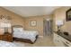 Bright bedroom featuring two twin beds and lots of natural light at 5920 Midnight Pass Rd # 104, Sarasota, FL 34242