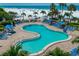 Resort-style pool with plenty of lounge chairs and beach access at 5920 Midnight Pass Rd # 104, Sarasota, FL 34242