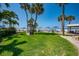 Beachfront community with lush landscaping and ample seating areas at 5920 Midnight Pass Rd # 104, Sarasota, FL 34242