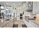 Modern kitchen with stainless steel appliances, granite countertops, and ample cabinet space at 5309 Greenbrook Dr, Sarasota, FL 34238