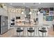 Spacious kitchen with island, stainless steel appliances, and granite countertops at 5309 Greenbrook Dr, Sarasota, FL 34238