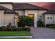 Home exterior showcasing the front entrance at 5309 Greenbrook Dr, Sarasota, FL 34238
