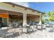 Outdoor bar and dining area with retractable awnings at 5309 Greenbrook Dr, Sarasota, FL 34238