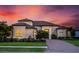 Beautiful two-story home with a brick driveway at 5309 Greenbrook Dr, Sarasota, FL 34238