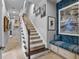 Elegant staircase with built-in window seat at 5309 Greenbrook Dr, Sarasota, FL 34238