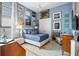 Cozy bedroom with gallery wall and plenty of natural light at 5309 Greenbrook Dr, Sarasota, FL 34238
