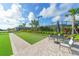 Enjoy bocce ball on this community court with seating area at 5309 Greenbrook Dr, Sarasota, FL 34238