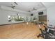 Bright fitness center with spin bikes and wood flooring at 5309 Greenbrook Dr, Sarasota, FL 34238