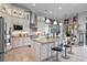 Gourmet kitchen with white cabinets, granite countertops, and stainless steel appliances at 5309 Greenbrook Dr, Sarasota, FL 34238