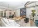 Spacious community lounge with comfortable seating and large screen TV at 5309 Greenbrook Dr, Sarasota, FL 34238