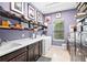 Bright laundry room with washer, dryer, and ample storage at 5309 Greenbrook Dr, Sarasota, FL 34238
