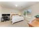 Large main bedroom with a workspace and plenty of natural light at 3902 Willow Hammock Dr, Palmetto, FL 34221
