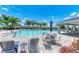 Inviting community pool with ample seating at 3902 Willow Hammock Dr, Palmetto, FL 34221