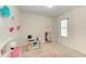 Charming ' bedroom with playful decor and ample space at 3902 Willow Hammock Dr, Palmetto, FL 34221