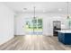Bright dining room with sliding glass doors leading to the backyard at 4593 Targee Ave, North Port, FL 34287