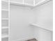 Large walk-in closet with built-in shelves and hanging rods at 4593 Targee Ave, North Port, FL 34287
