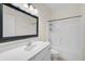 Bathroom with a tub, white vanity, and mirror at 14939 Amberjack Ter # 102, Lakewood Ranch, FL 34202