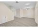 Living room with gray floors and neutral walls at 14939 Amberjack Ter # 102, Lakewood Ranch, FL 34202