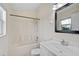 Clean bathroom with a shower/tub combo and white vanity at 14939 Amberjack Ter # 102, Lakewood Ranch, FL 34202