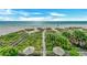 Aerial view of beach access and lush landscaping at 2510 Gulf N Dr, Bradenton Beach, FL 34217