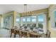Bright dining room with ocean views at 2510 Gulf N Dr, Bradenton Beach, FL 34217