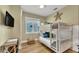 Bedroom with bunk beds and coastal decor at 2510 Gulf N Dr, Bradenton Beach, FL 34217